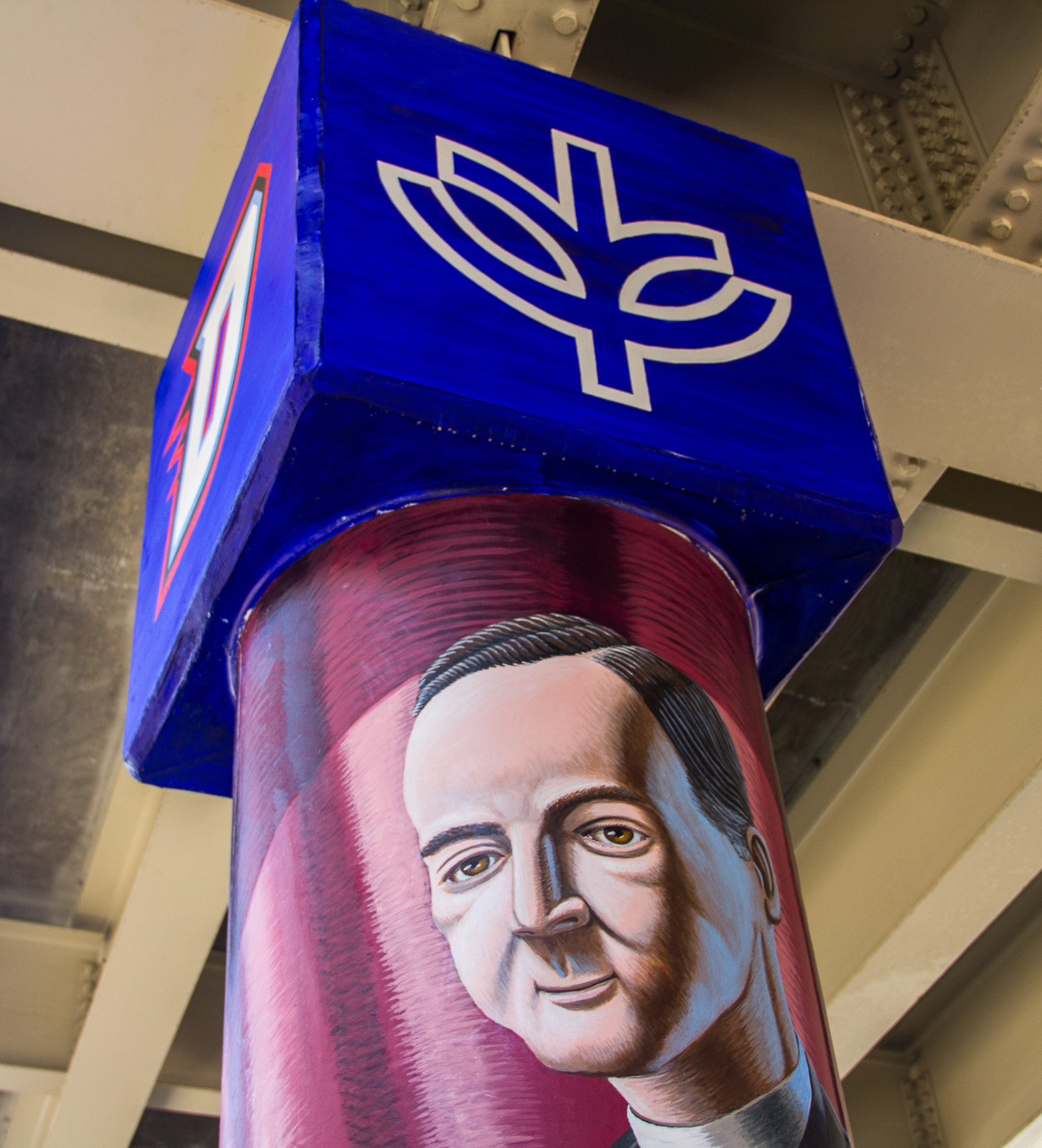 The Rev. Francis Xavier McCabe, C.M., DePaul's second president, who kept the university open during World War I is featured on one of the new pillars located under Fullerton 'L' tracks, part of the public art project, "The Story of the Little School Under the 'L'" project began in 2016 by Brother Mark Elder, C.M.  (DePaul University/Russell Dorn)